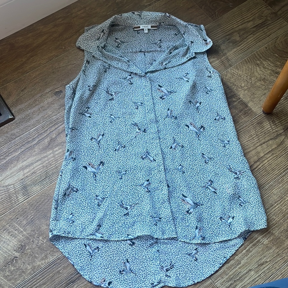 Button down sleeveless shirt